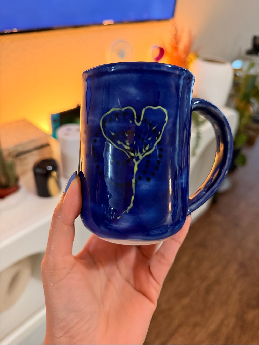 Handmade Deep Blue Ceramic Mug with hand painted Green Floral Accent